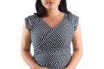 Adjustable neckline can be positioned for more or less coverage over the chest