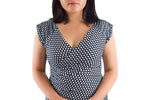 Adjustable neckline can be positioned for more or less coverage over the chest